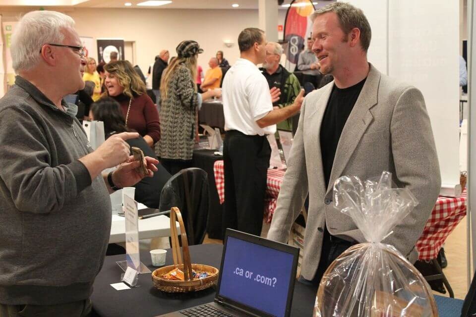 Wes Bailey talking with Client